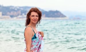 Žena