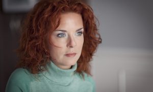 Žena